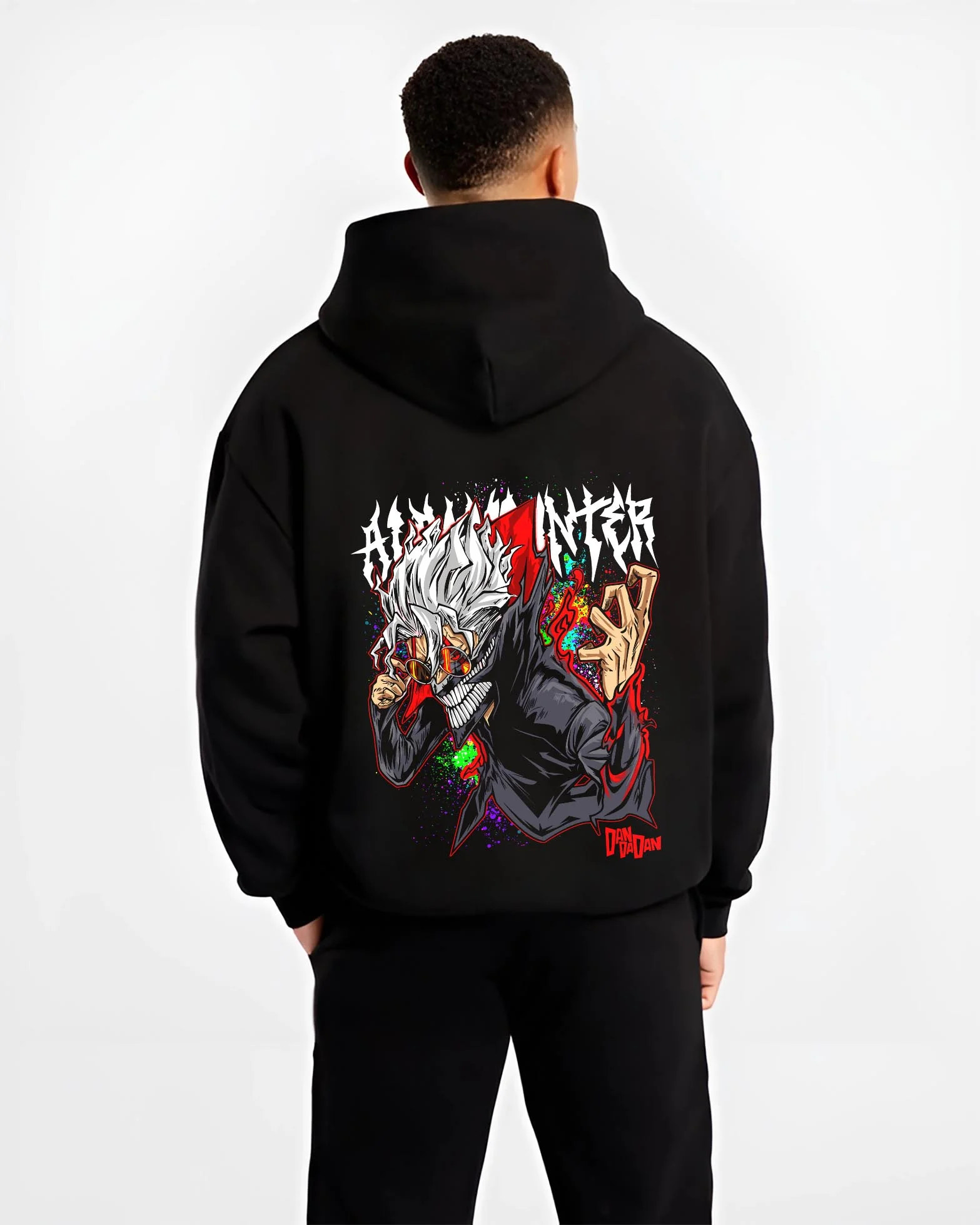 Black hoodie worn by male model, back view with Evil Spirit Hoodie Dandadan Horror Monster Scene graphic bold anime graphic.