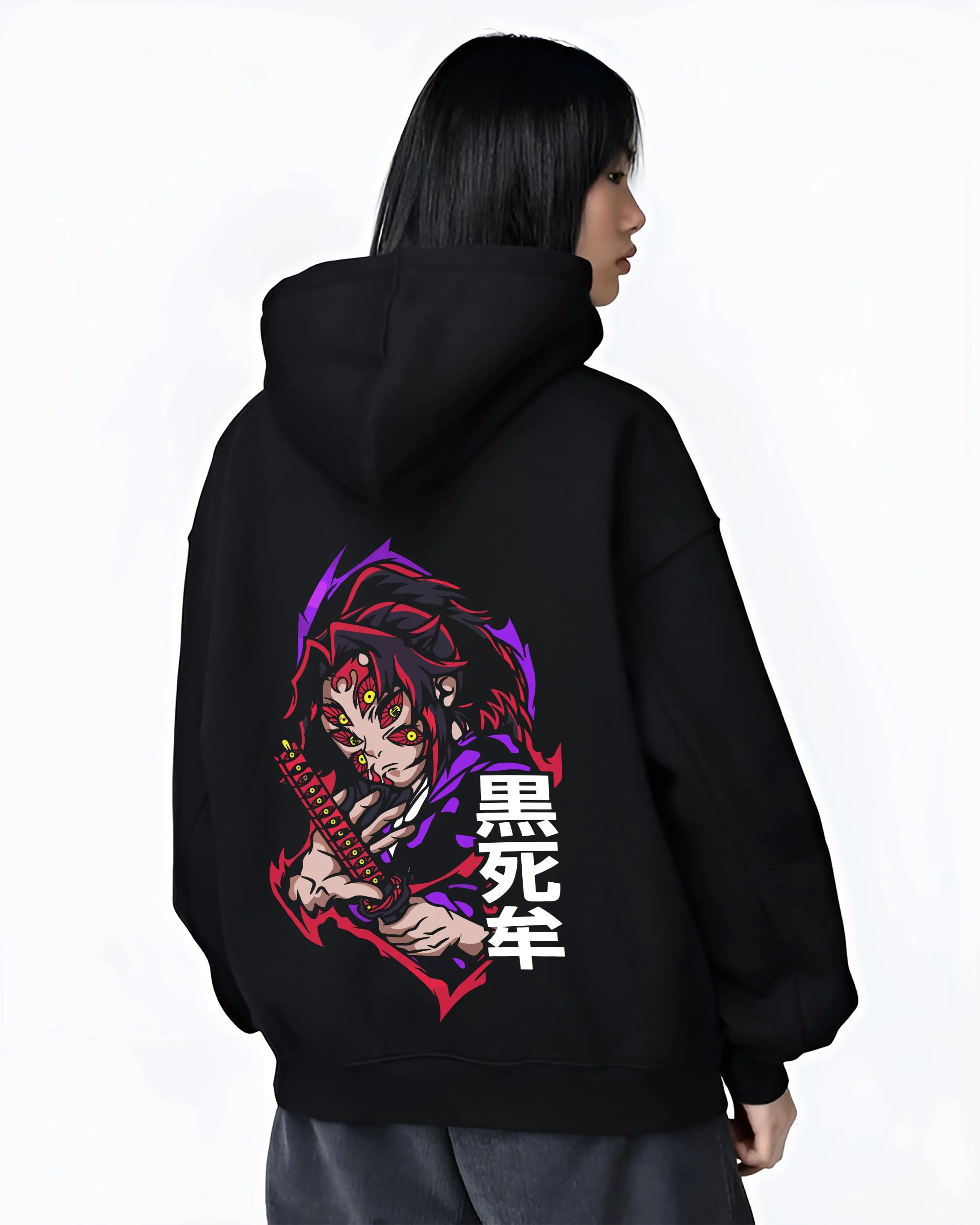 Black hoodie worn by female model, back view with Kokushibo Hoodie Demon Slayer Moon Breathing Form graphic bold anime graphic.
