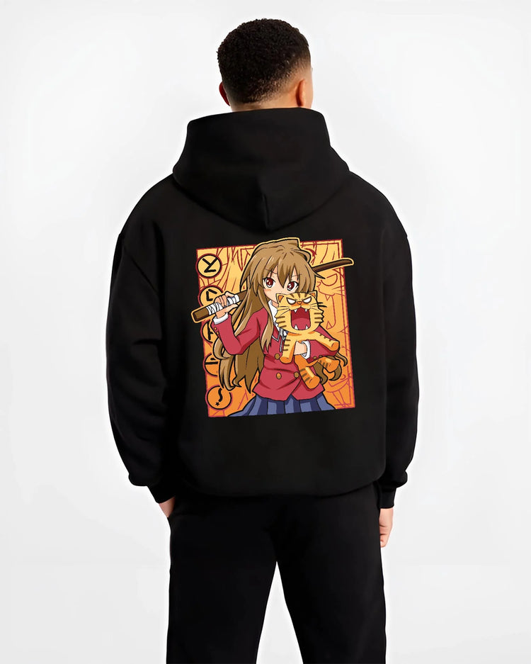 Black hoodie worn by male model, back view with Taiga Hoodie Toradora Anime Tiger Romantic Comedy graphic bold anime graphic.