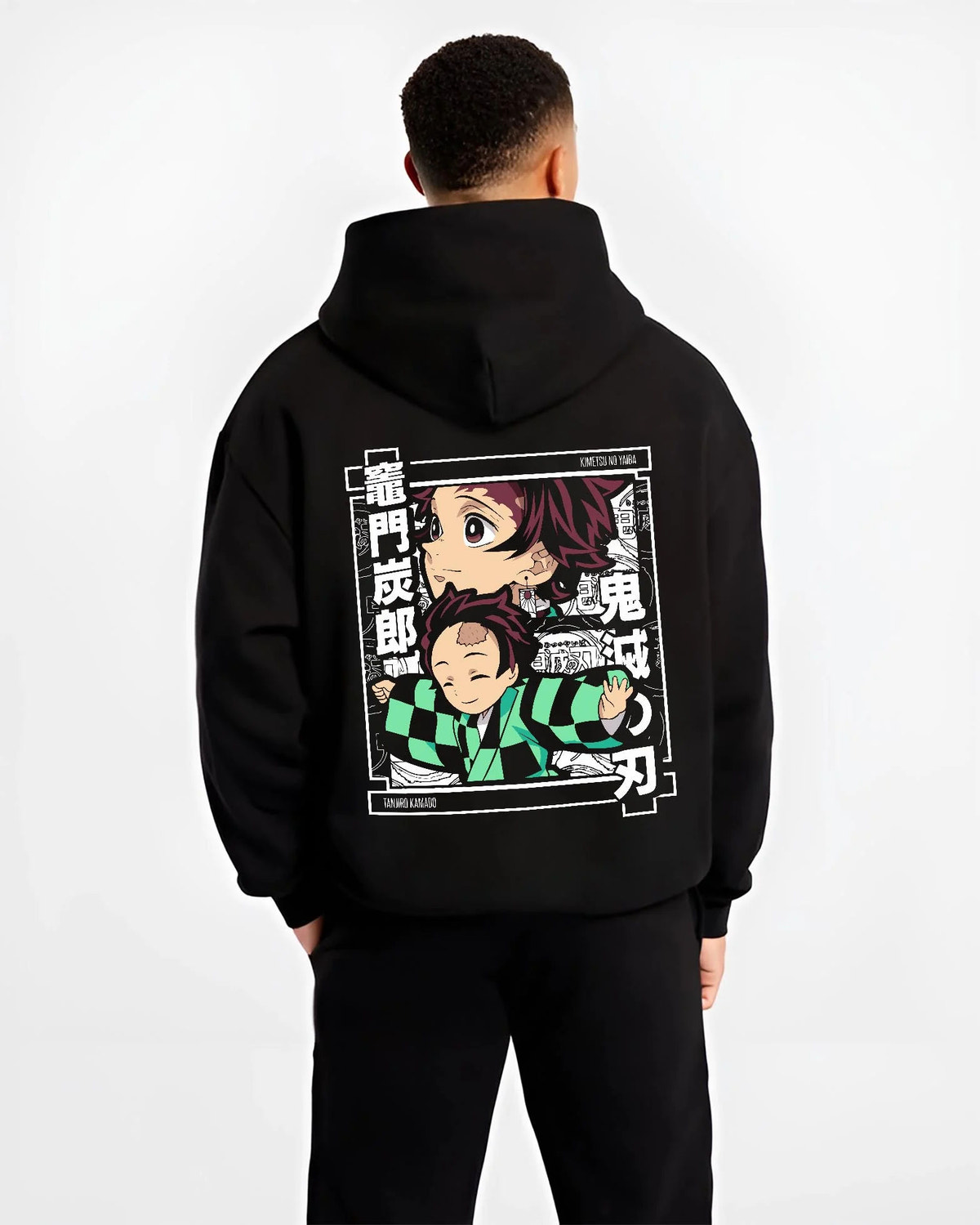 Black hoodie worn by male model from the back featuring Tanjiro Kamado chibi family Demon Slayer artwork.