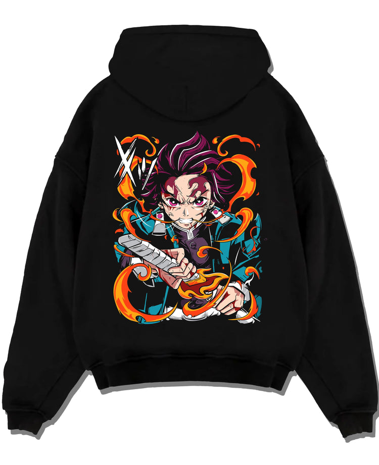 Black hoodie laid flat featuring Tanjiro Kamado Hinokami Kagura flame sword Demon Slayer artwork.