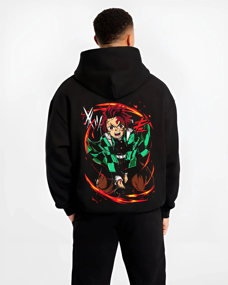 Black hoodie worn by male model from the back featuring Tanjiro Kamado Water Wheel breathing Demon Slayer artwork.