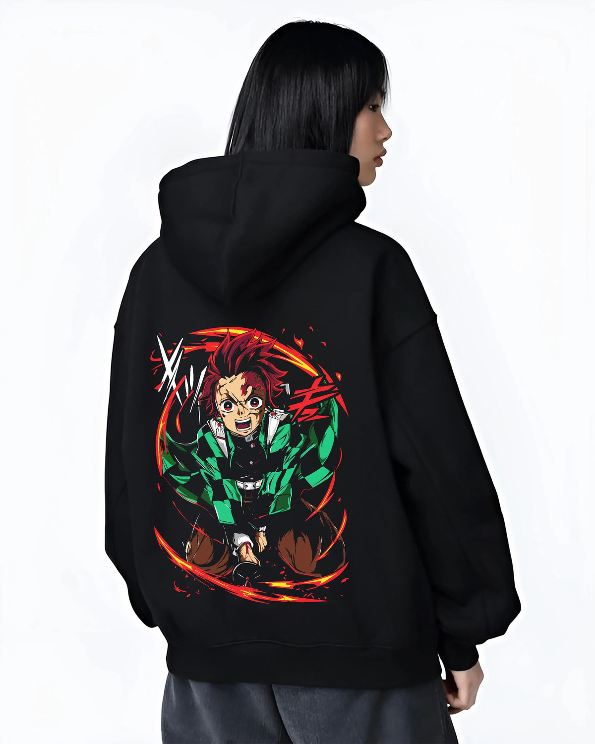 Black hoodie worn by female model from the back featuring Tanjiro Kamado Water Wheel breathing Demon Slayer artwork.