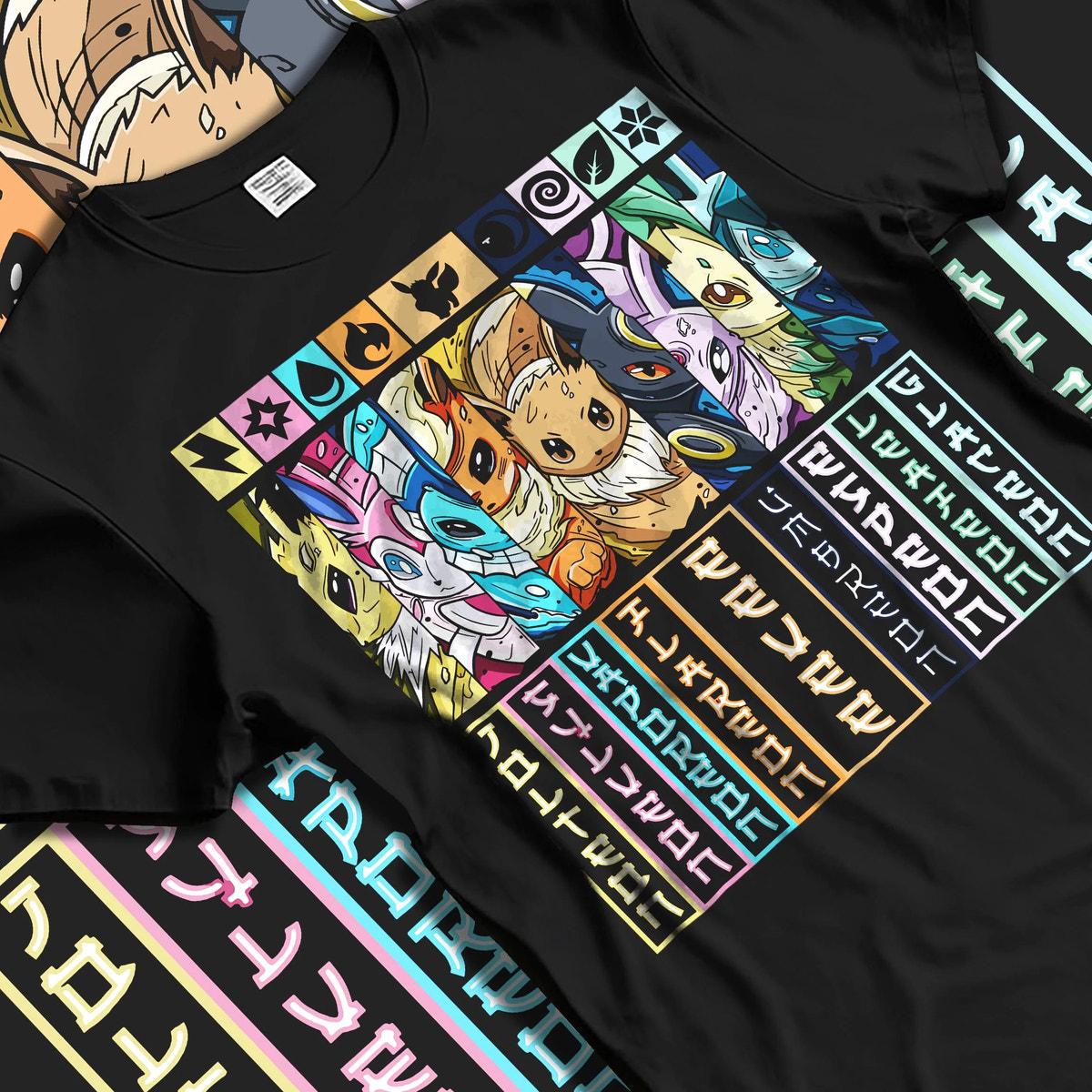 Black T-shirt laid flat with natural folds featuring Eevee evolutions element types Pokemon artwork.