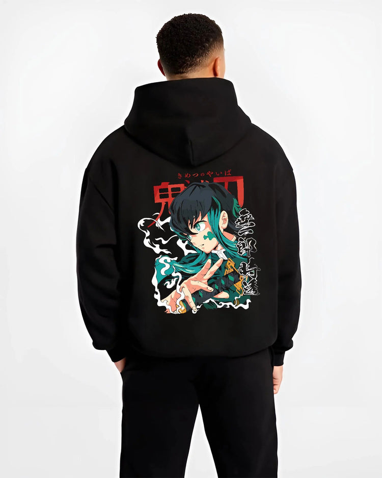 Black hoodie worn by male model from the back featuring Muichiro Tokito Mist Hashira teal portrait Demon Slayer artwork.