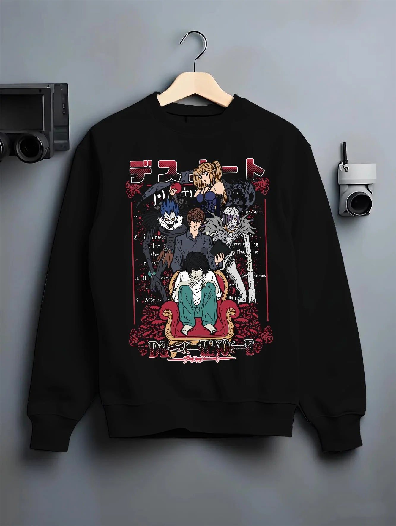 Black crewneck sweatshirt on hanger with Team Demon Slayer Hoodie Hashira Corps Gathering graphic bold anime graphic.