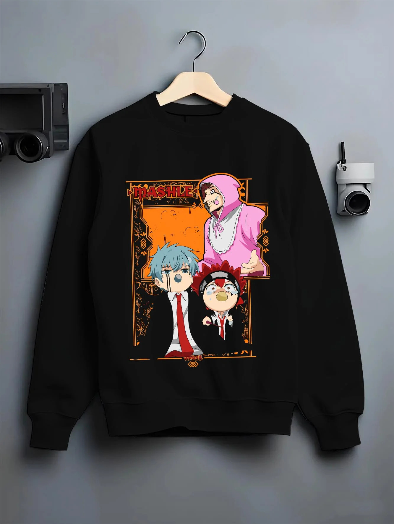 Black crewneck sweatshirt on hanger with Mashle Team Hoodie Mashle Magic and Muscles Duo graphic streetwear graphic.