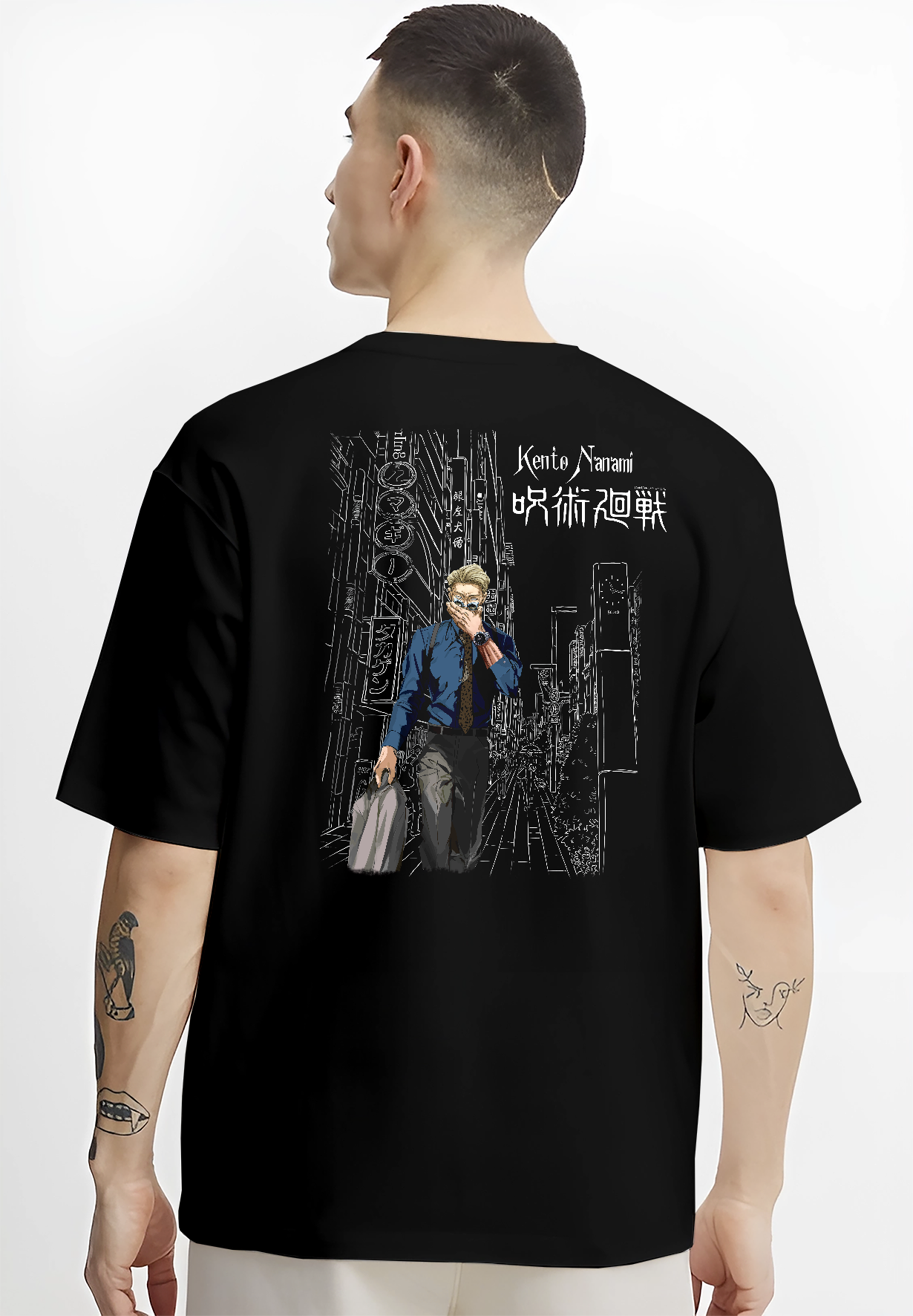 Black T-shirt worn by a male model, back view, featuring Jujutsu Kaisen Nanami Kento dark manga panel inspired artwork with urban street scene design.