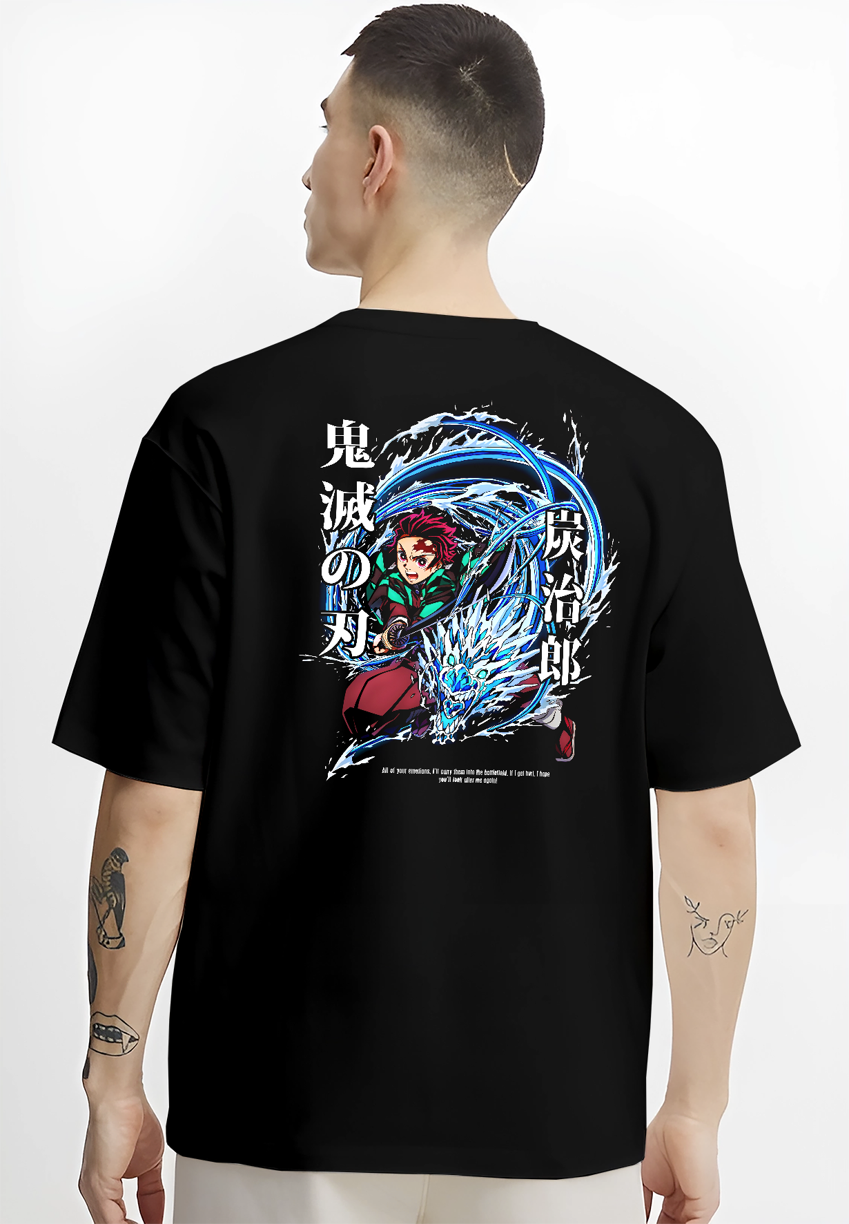 Black T-shirt worn by a male model, back view, featuring Tanjiro Kamado Demon Slayer manga artwork print with Water Breathing dragon and dynamic sword strike.