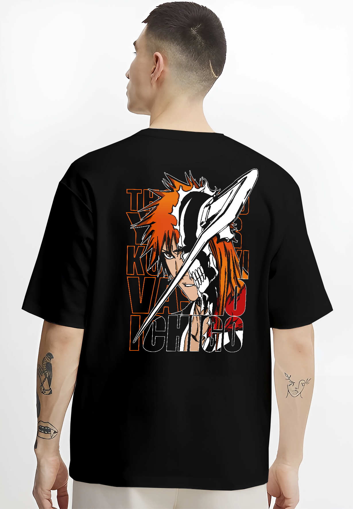 Black T-shirt worn by a male model, back view, featuring Bleach Ichigo Kurosaki Vasto Lorde Japanese animation streetwear graphic with retro manga artwork details.