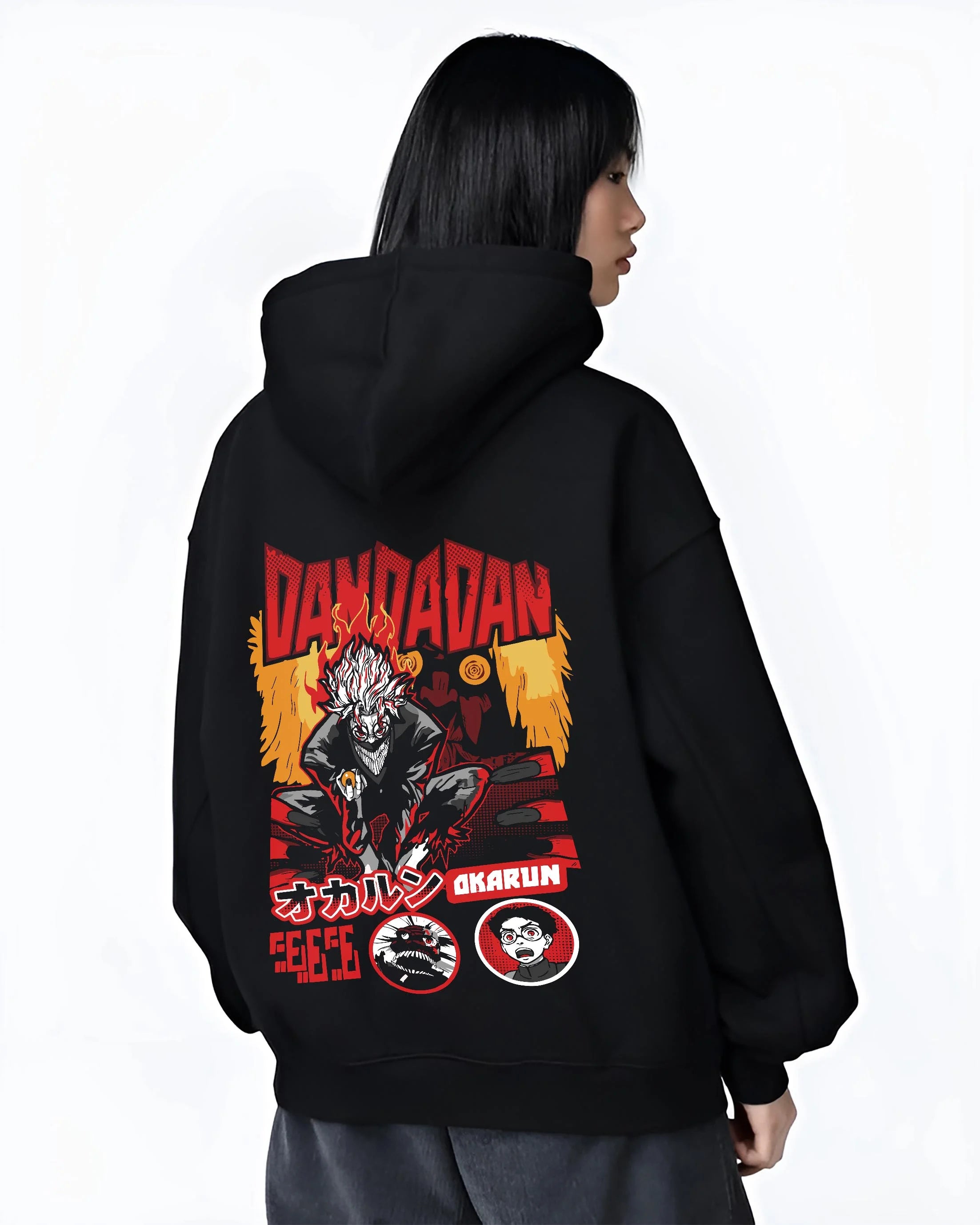 Black hoodie worn by female model, back view with Okarun Hoodie Dandadan Possessed Spirit Alien Fight graphic premium wear.