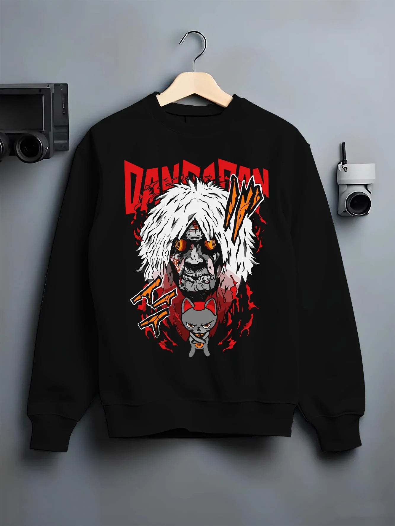 Black crewneck sweatshirt on hanger with Reiko Hoodie Dandadan Spirit Medium Anime Battle graphic premium wear.