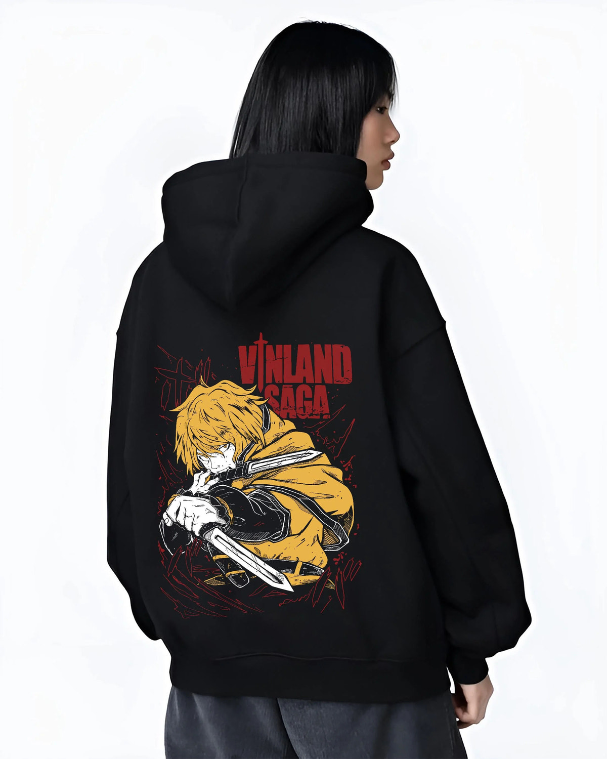 Black hoodie worn by female model from the back featuring Thorfinn Viking warrior dual blades Vinland Saga artwork.
