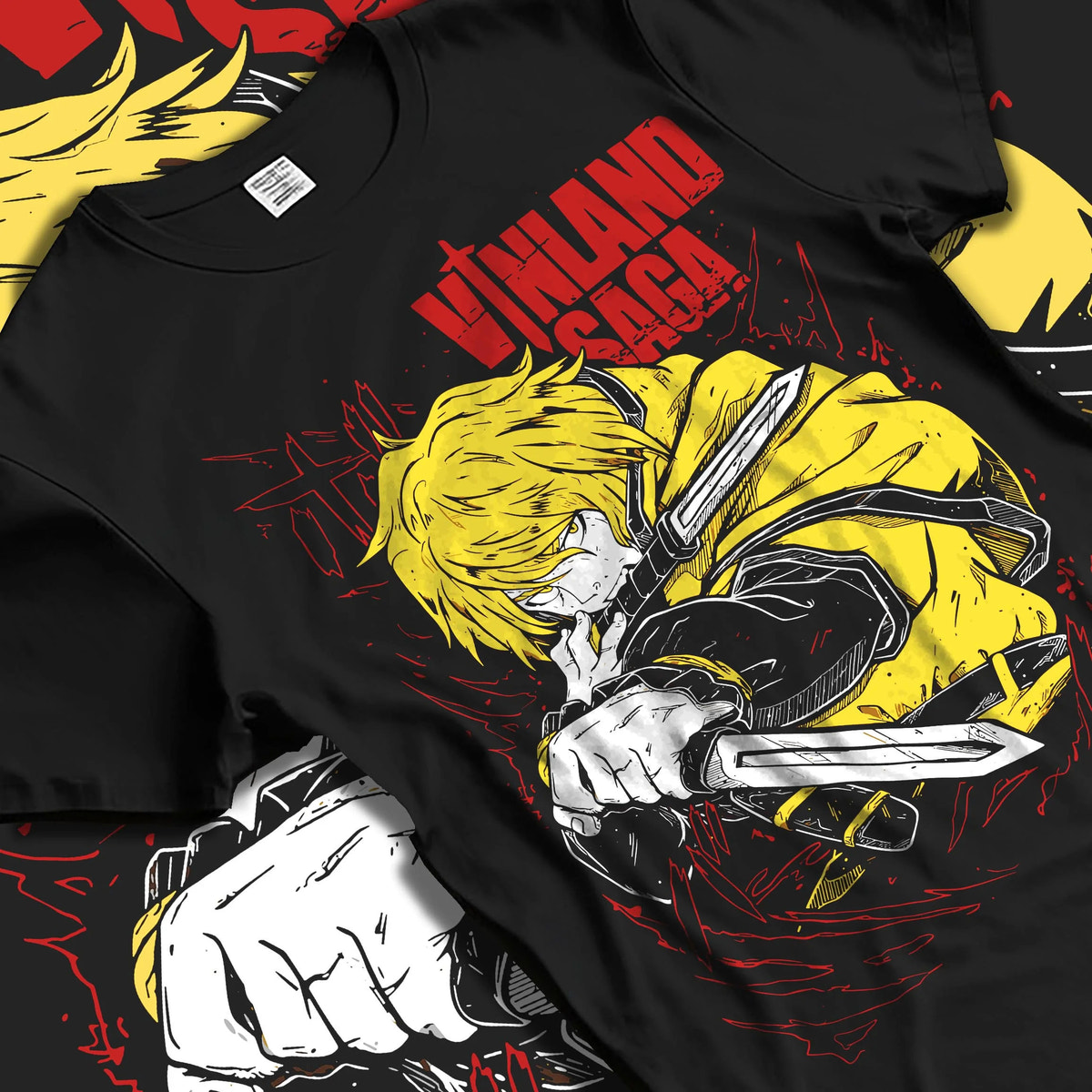 Black T-shirt laid flat with natural folds featuring Thorfinn Viking warrior dual blades Vinland Saga artwork.