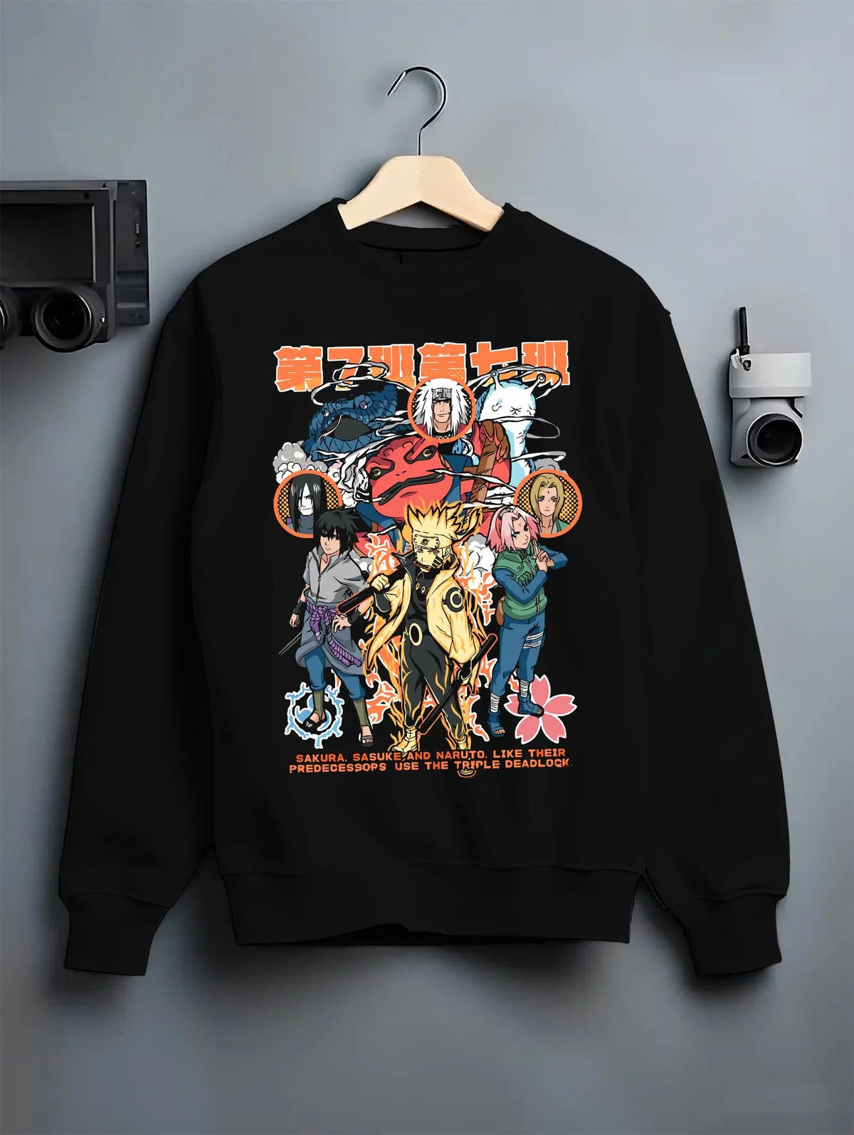 Black crewneck sweatshirt on hanger featuring Team 7 summoning jutsu ninja legacy Naruto artwork.
