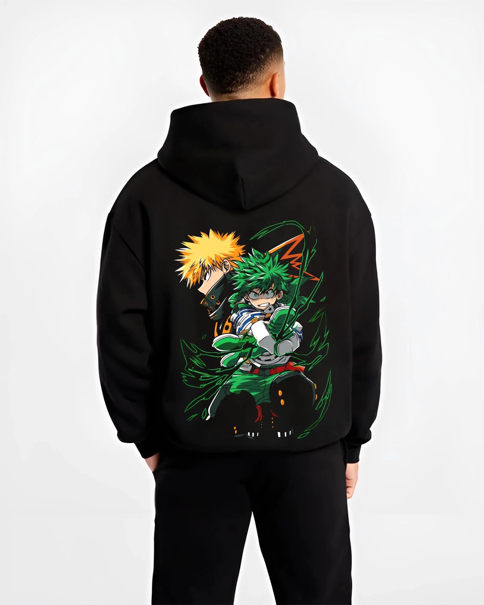 Black hoodie worn by male model, back view with Izuku Midoriya Hoodie My Hero Academia Fighting Pose graphic streetwear graphic.