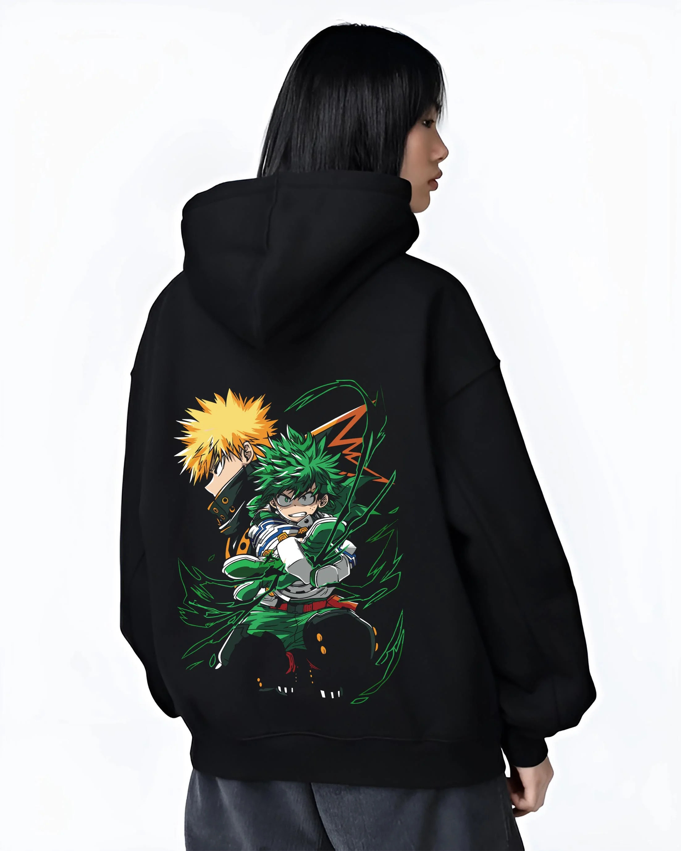 Black hoodie worn by female model, back view with Izuku Midoriya Hoodie My Hero Academia Fighting Pose graphic bold anime graphic.