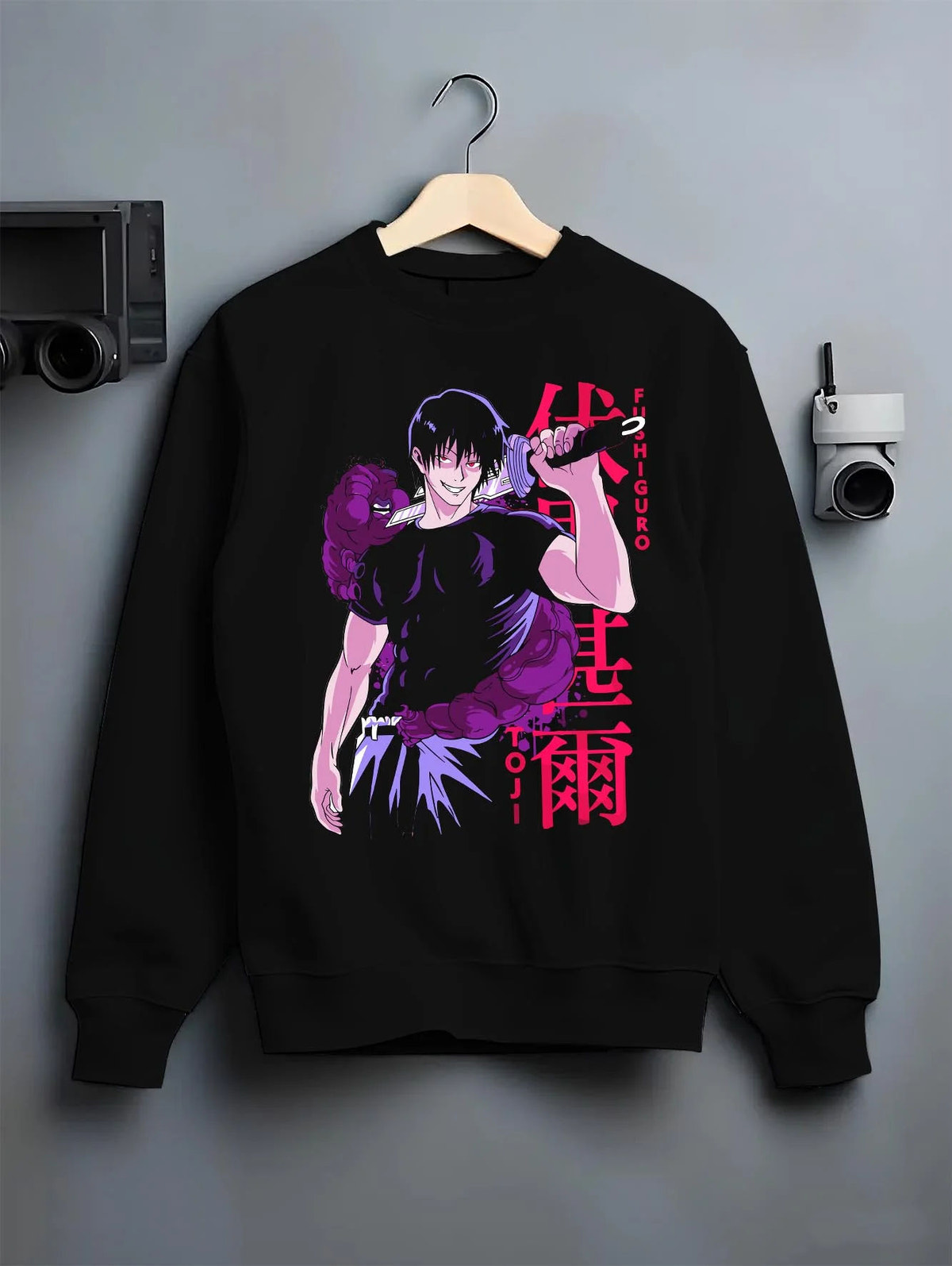 Black crewneck sweatshirt on hanger featuring Toji Fushiguro Playful Cloud battle Jujutsu Kaisen artwork.