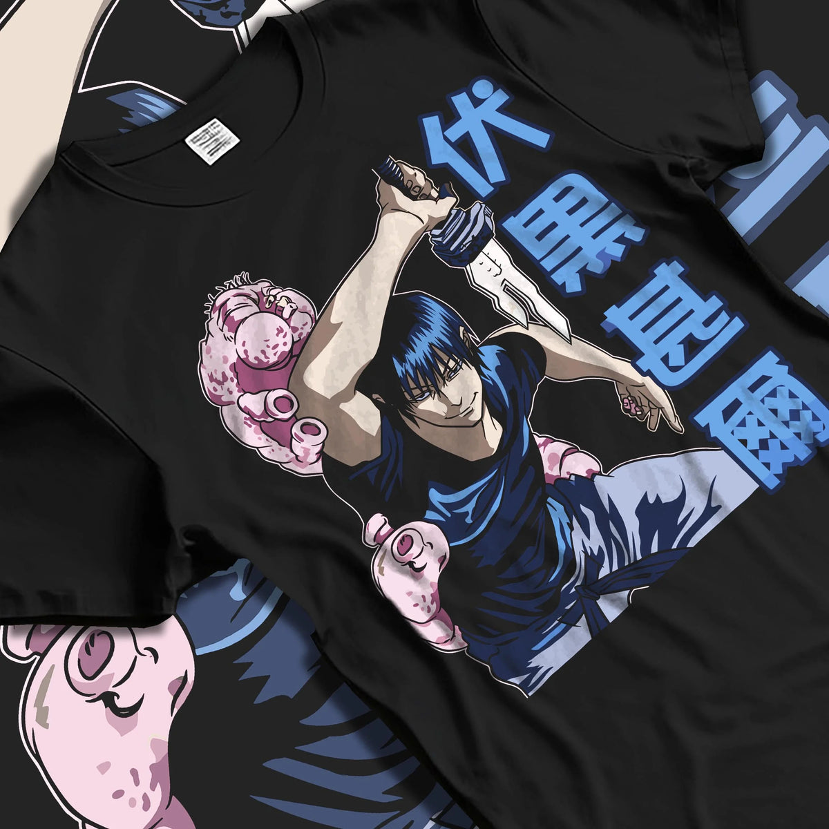Black T-shirt laid flat with natural folds featuring Toji Fushiguro Inverted Spear power Jujutsu Kaisen artwork.