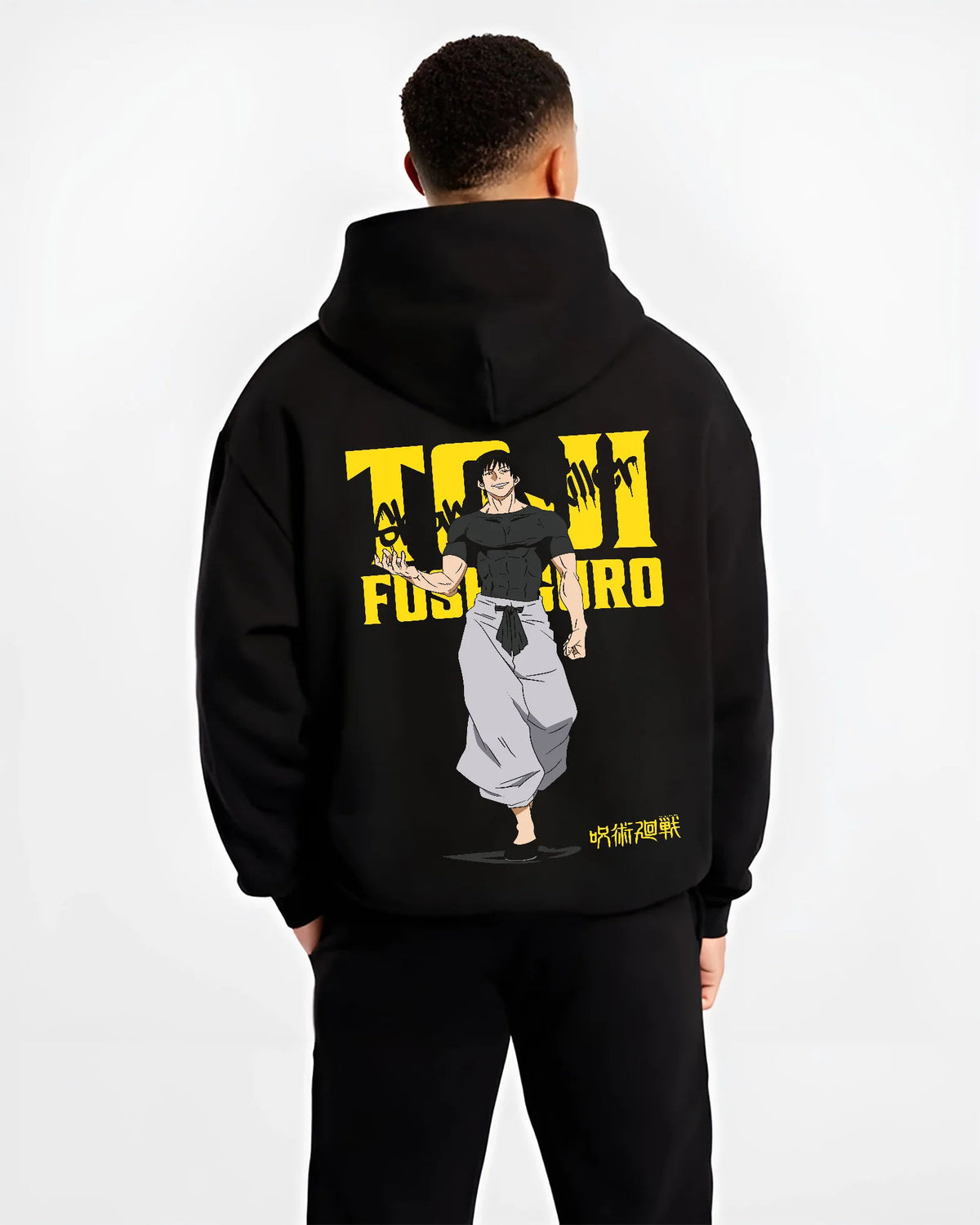 Black hoodie model back view showing Toji Fushiguro from Jujutsu Kaisen: yellow title poster