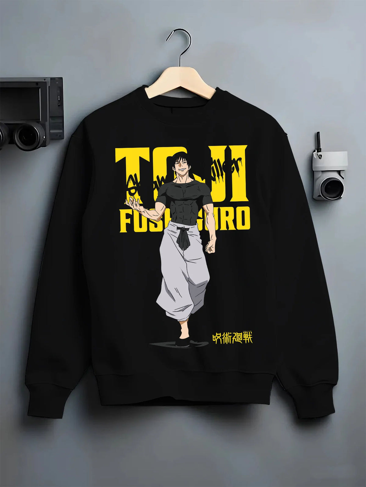 Black crewneck sweatshirt on hanger showing Toji Fushiguro from Jujutsu Kaisen: yellow title poster