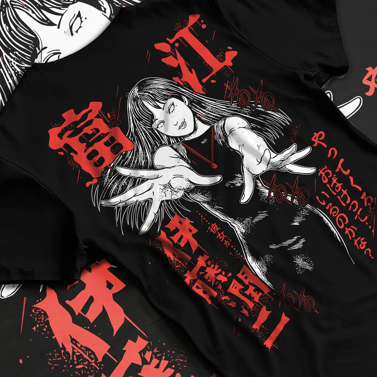 Black T-shirt flat back view showing Tomie Kawakami from Junji Ito: raised hands and horror portrait