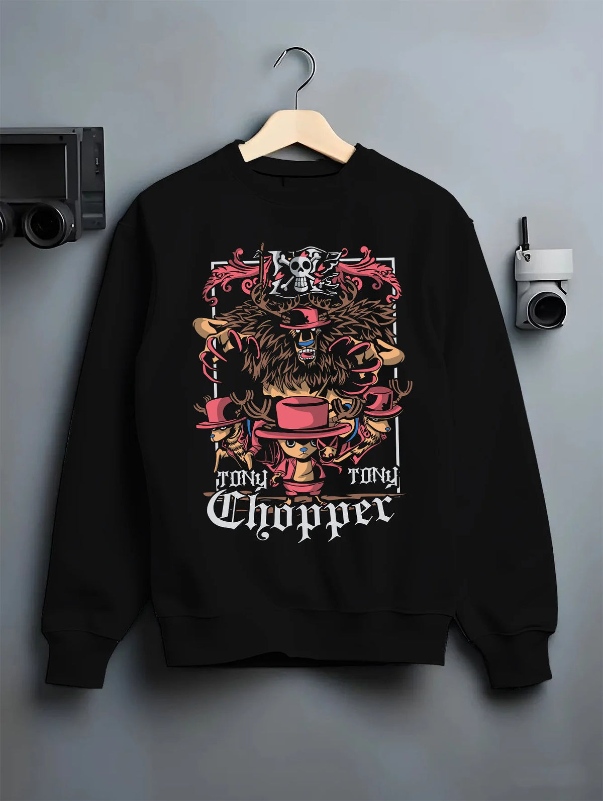 Black crewneck sweatshirt on hanger showing Tony Tony Chopper from One Piece: One Piece motif