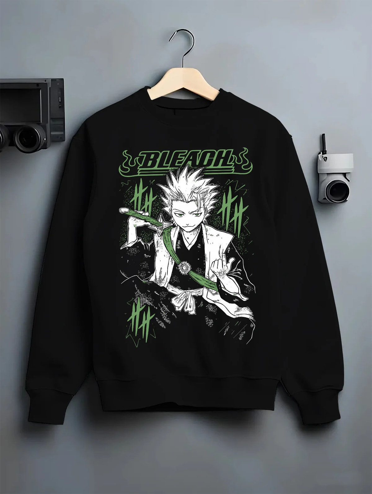 Black crewneck sweatshirt on hanger with Toshiro Hitsugaya from Bleach illustrated back graphic