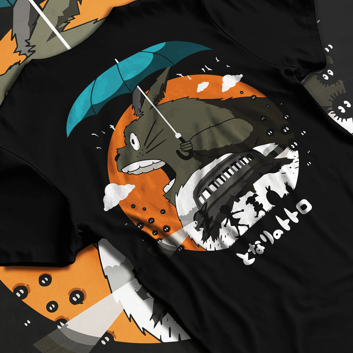 Black T-shirt flat back view with Totoro with umbrella and woodland house from My Neighbor Totoro / Studio Ghibli