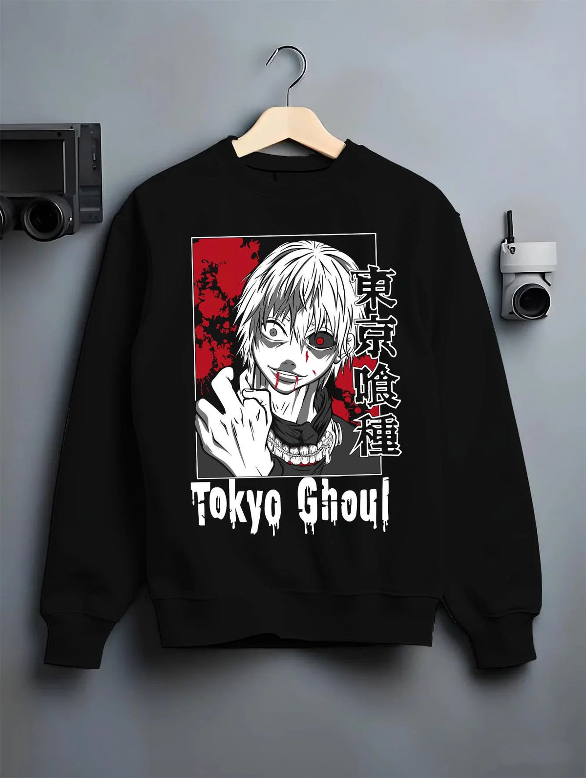 Black crewneck sweatshirt on hanger featuring Ken Kaneki One-Eyed Ghoul mask portrait Tokyo Ghoul artwork.