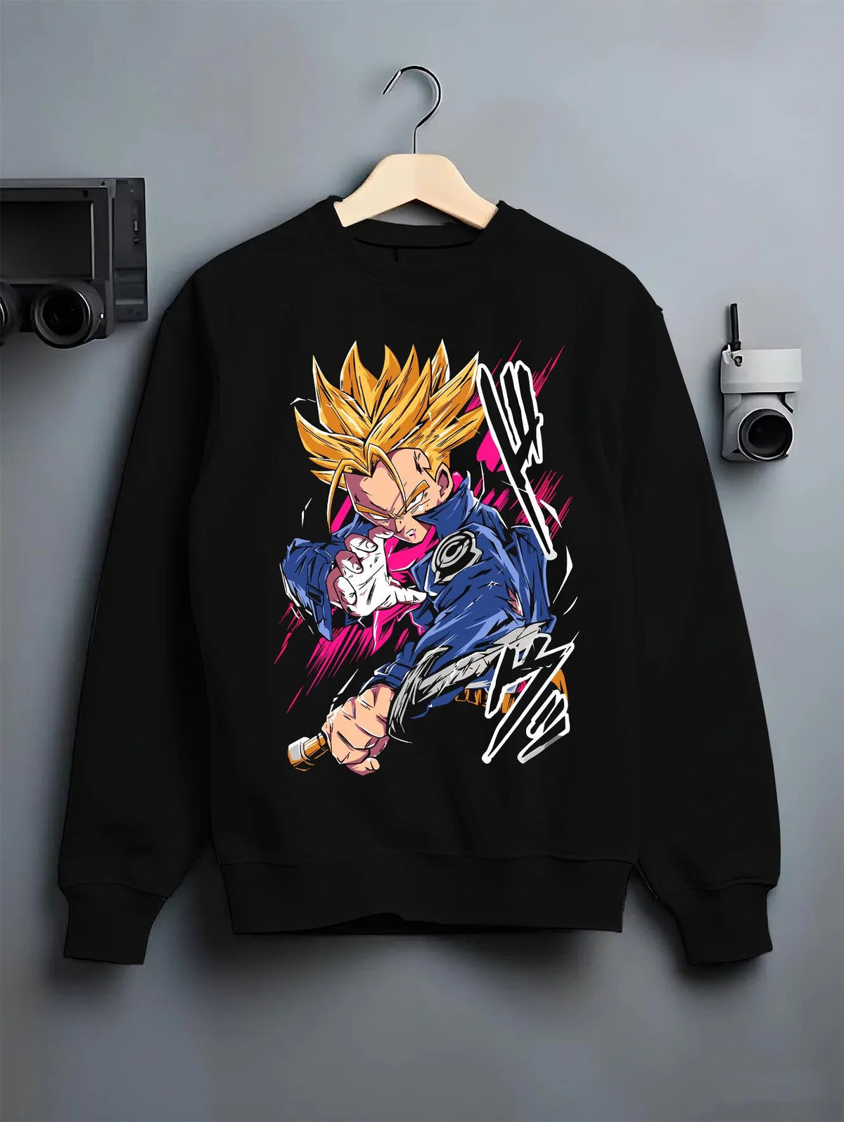 Black crewneck sweatshirt on hanger featuring Future Trunks Super Saiyan sword battle Dragon Ball artwork.