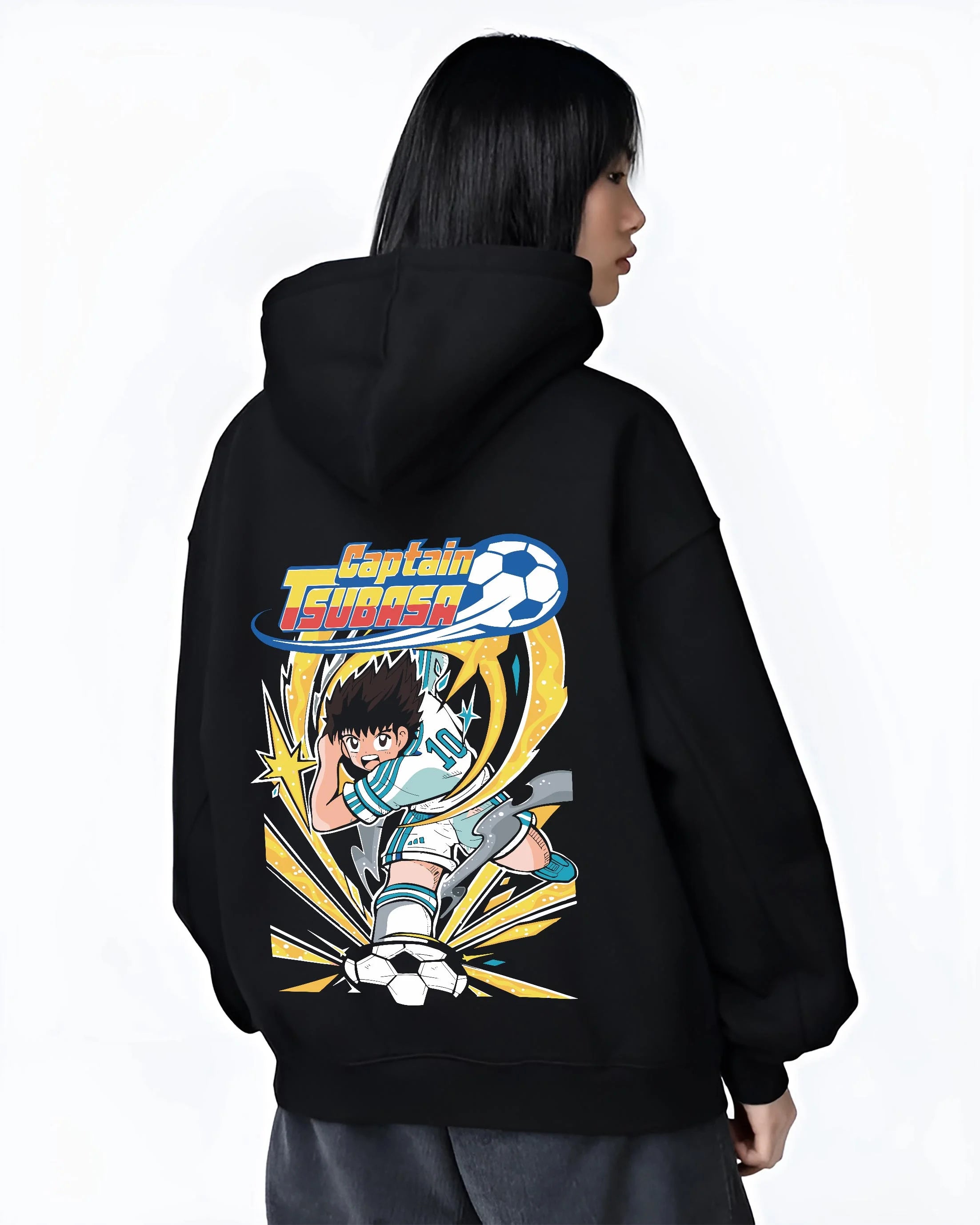 Black hoodie worn by female model, back view with Tsubasa Hoodie Captain Tsubasa Soccer Kick Classic graphic premium wear.