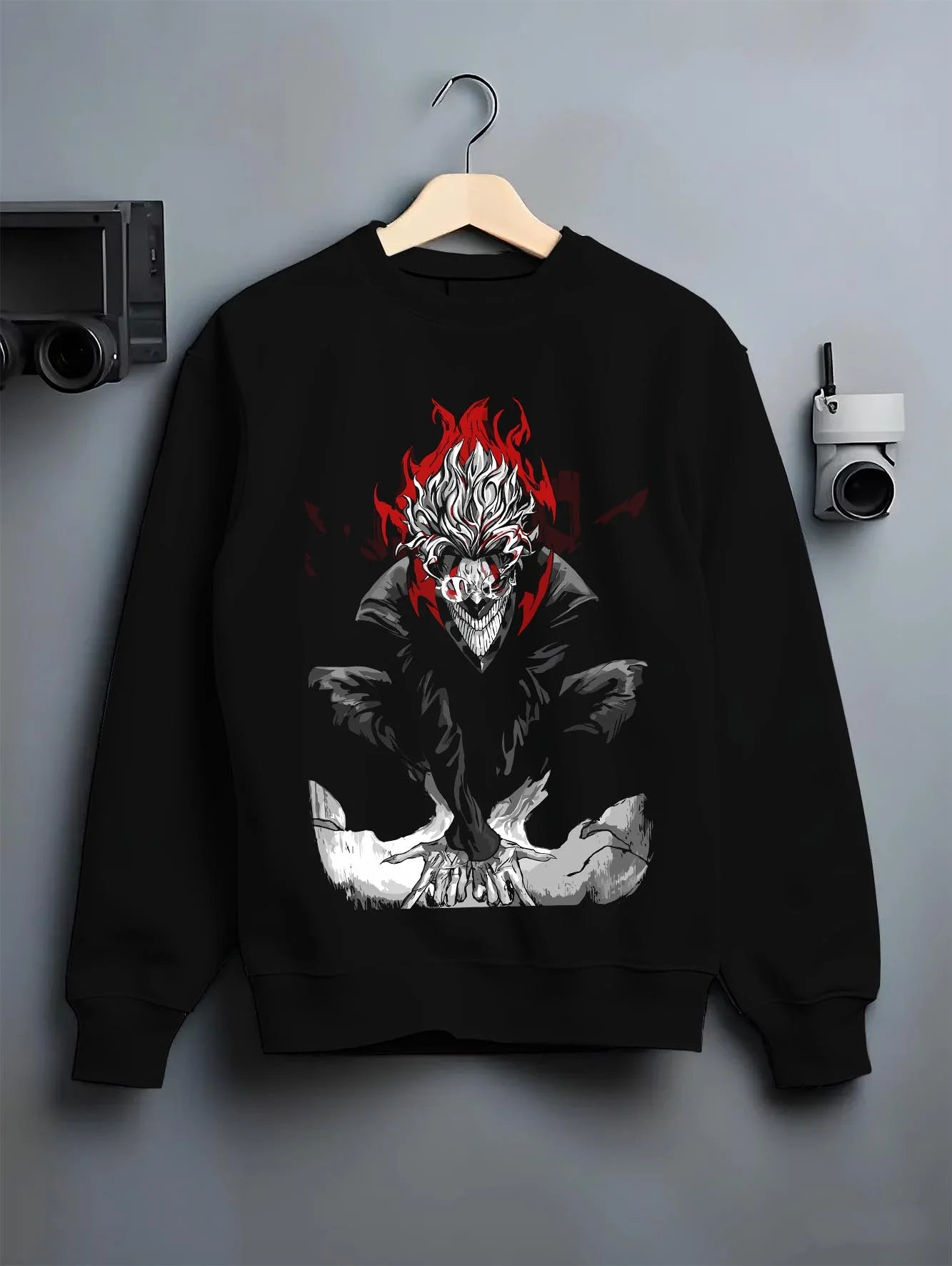 Black crewneck sweatshirt on hanger with Turbo Granny Hoodie Dandadan Evil Spirit Form graphic streetwear graphic.