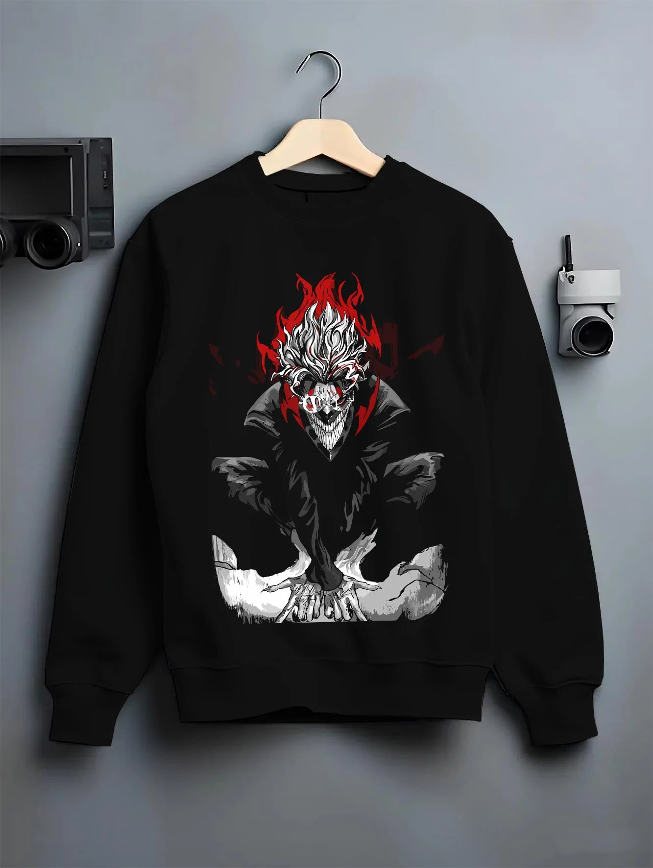 Black crewneck sweatshirt on hanger with Turbo Granny Hoodie Dandadan Evil Spirit Form graphic streetwear graphic.