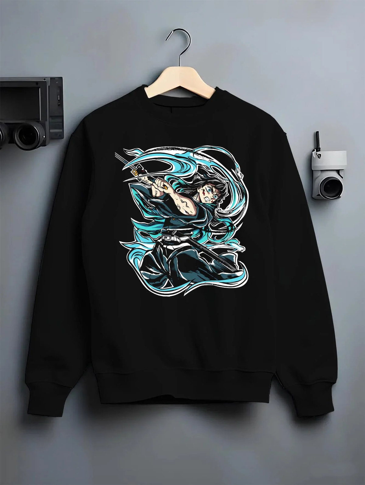 Black crewneck sweatshirt on hanger featuring Muichiro Tokito mist sword battle Demon Slayer artwork.