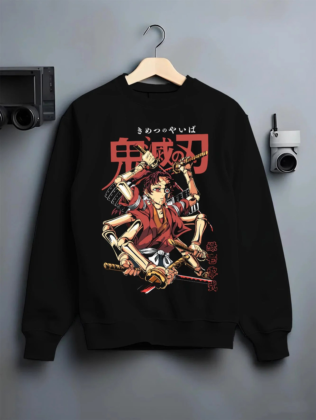 Black crewneck sweatshirt on hanger featuring Yoriichi Type Zero training doll Demon Slayer artwork.