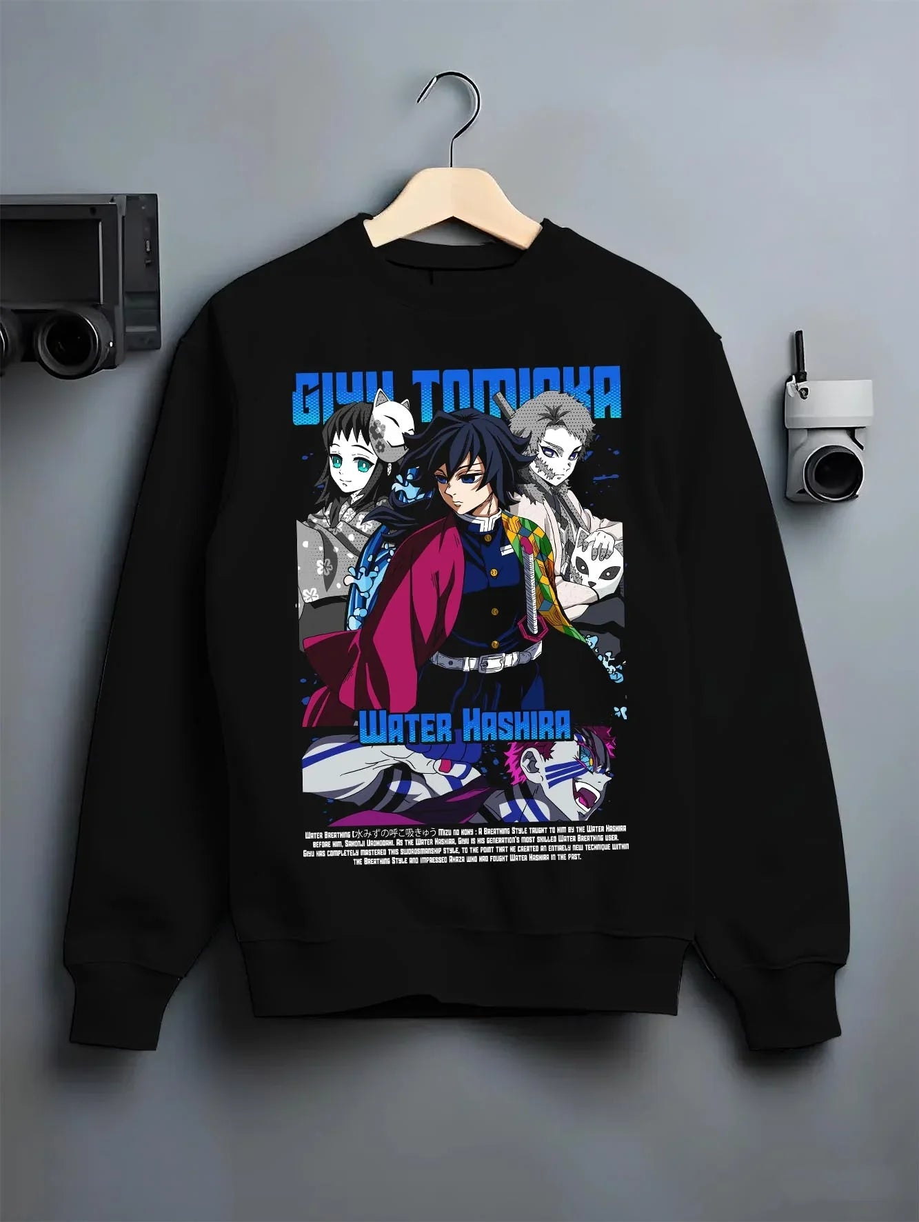 Black crewneck sweatshirt on hanger with Giyu Hoodie Demon Slayer Water Hashira Anime Corps graphic bold anime graphic.