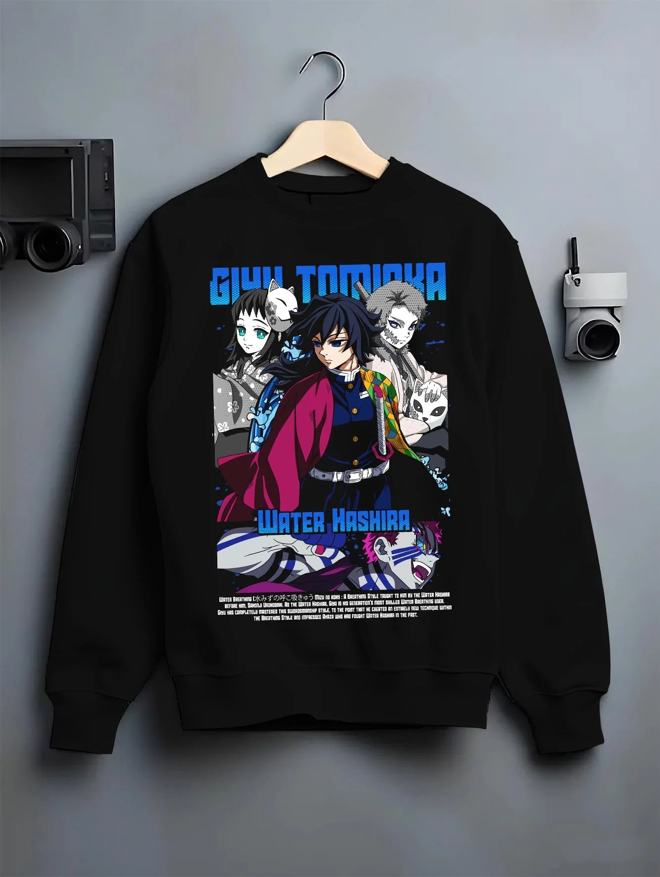 Black crewneck sweatshirt on hanger with Giyu Hoodie Demon Slayer Water Hashira Anime Corps graphic bold anime graphic.