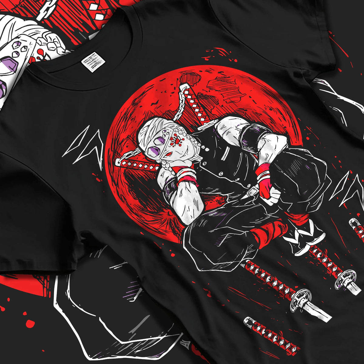 Black T-shirt laid flat with natural folds featuring Tengen Uzui Sound Hashira flame battle Demon Slayer artwork.