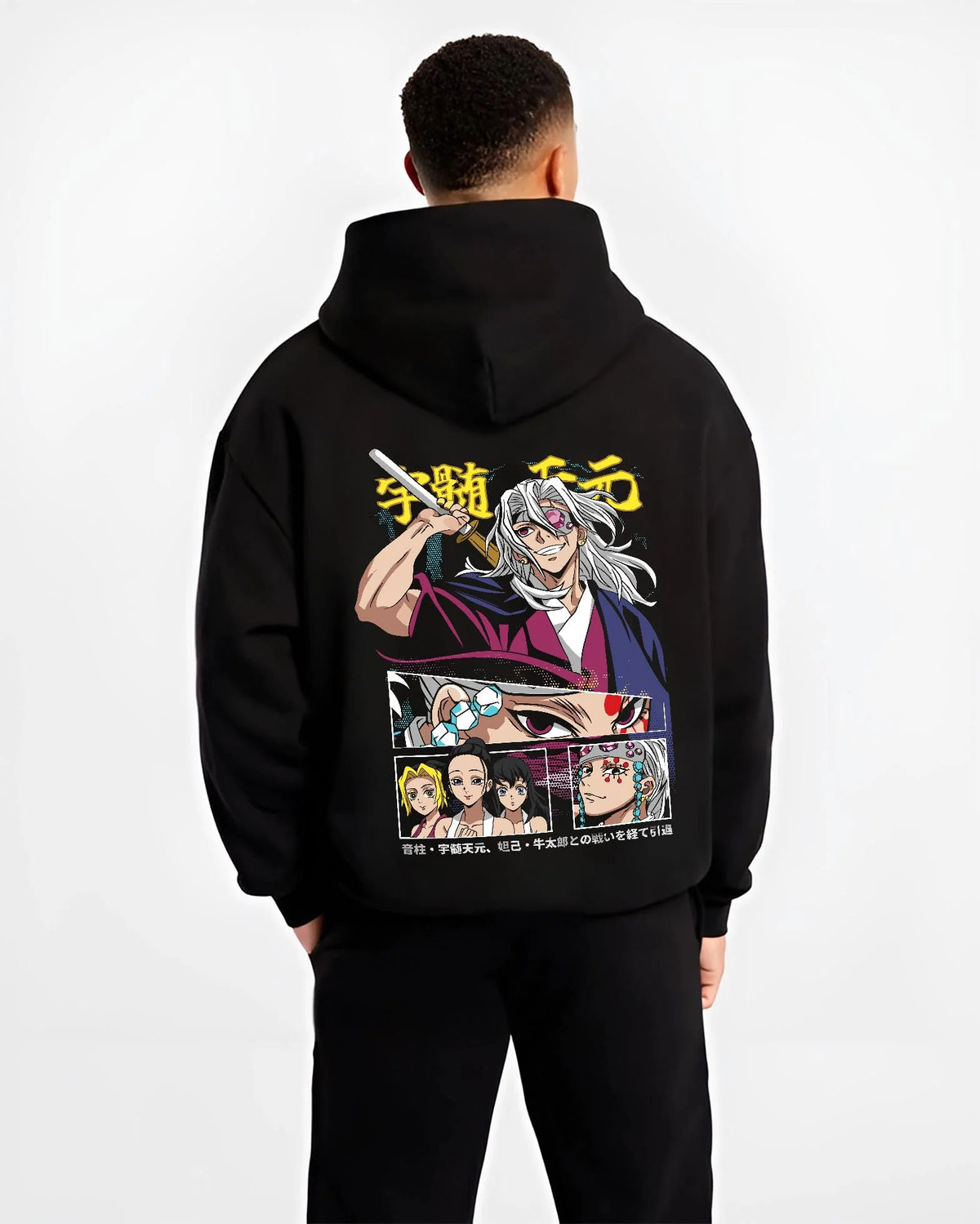 Black hoodie worn by male model from the back featuring Tengen Uzui flashy Sound Hashira Demon Slayer artwork.