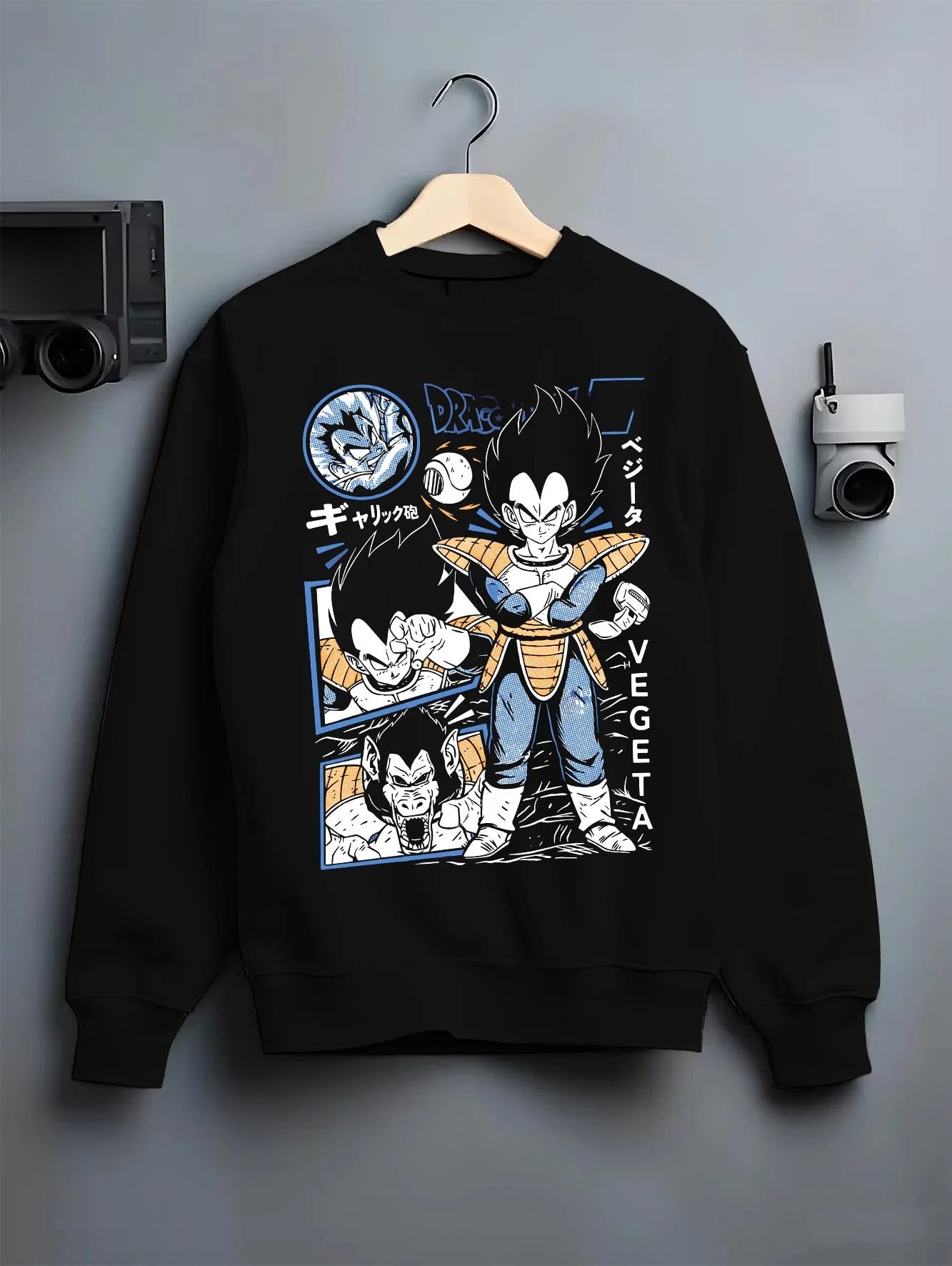 Black crewneck sweatshirt on hanger with Vegeta Hoodie Dragon Ball Z Prince Saiyan Elite graphic streetwear graphic.
