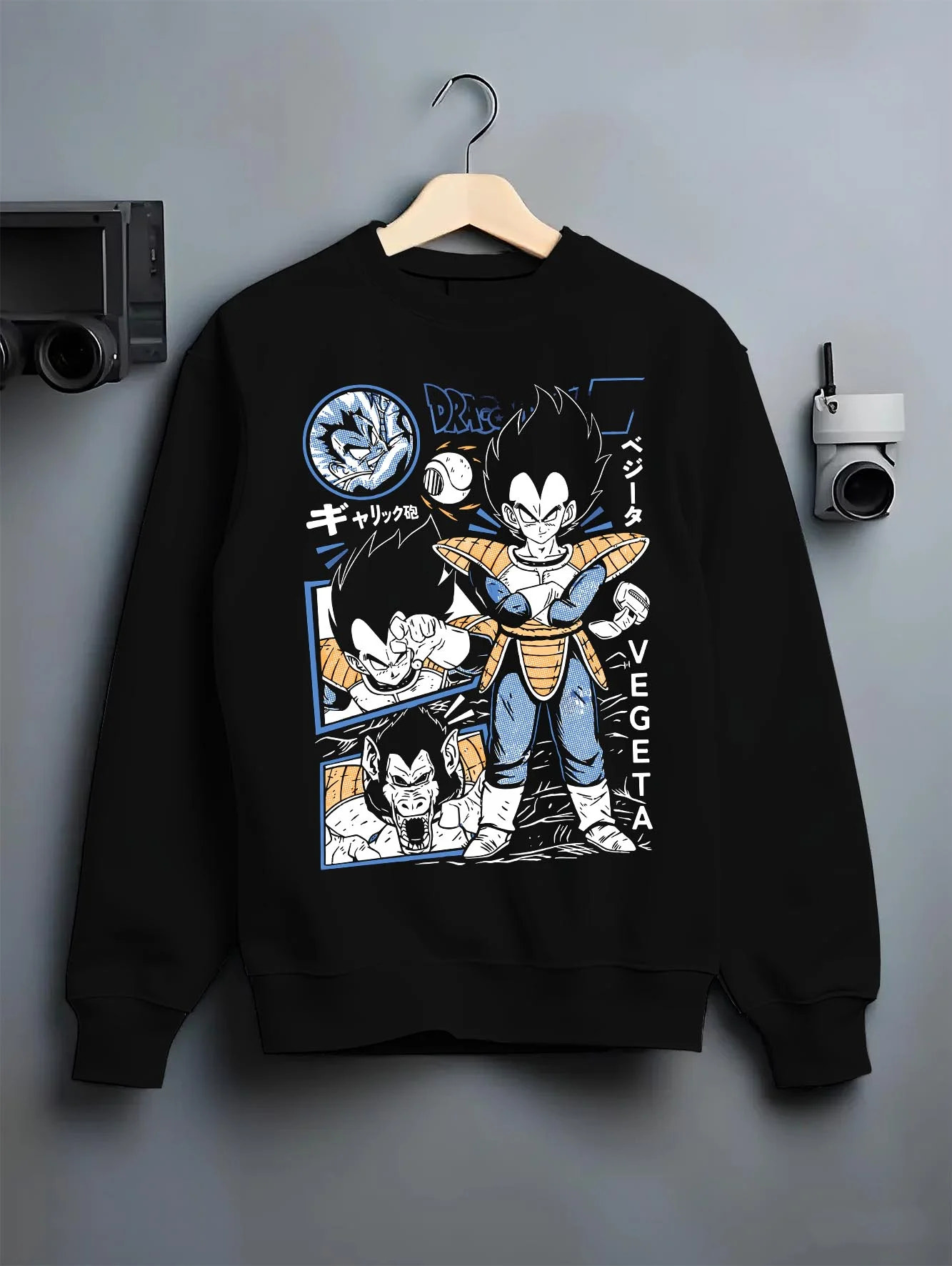 Black crewneck sweatshirt on hanger with Vegeta Hoodie Dragon Ball Z Prince Saiyan Elite graphic streetwear graphic.