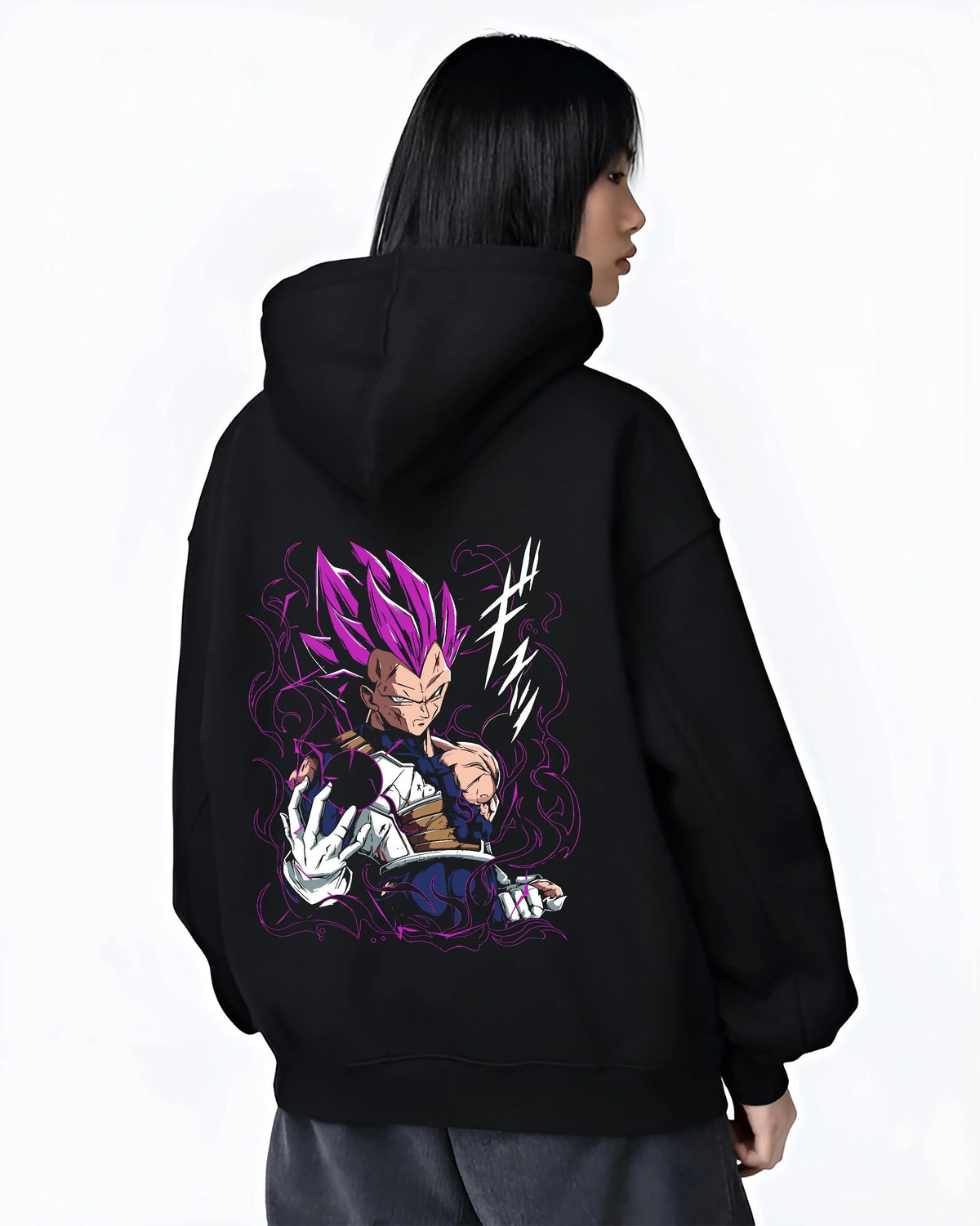 Black hoodie worn by female model from the back featuring Vegeta Ultra Ego purple aura battle Dragon Ball Super artwork.