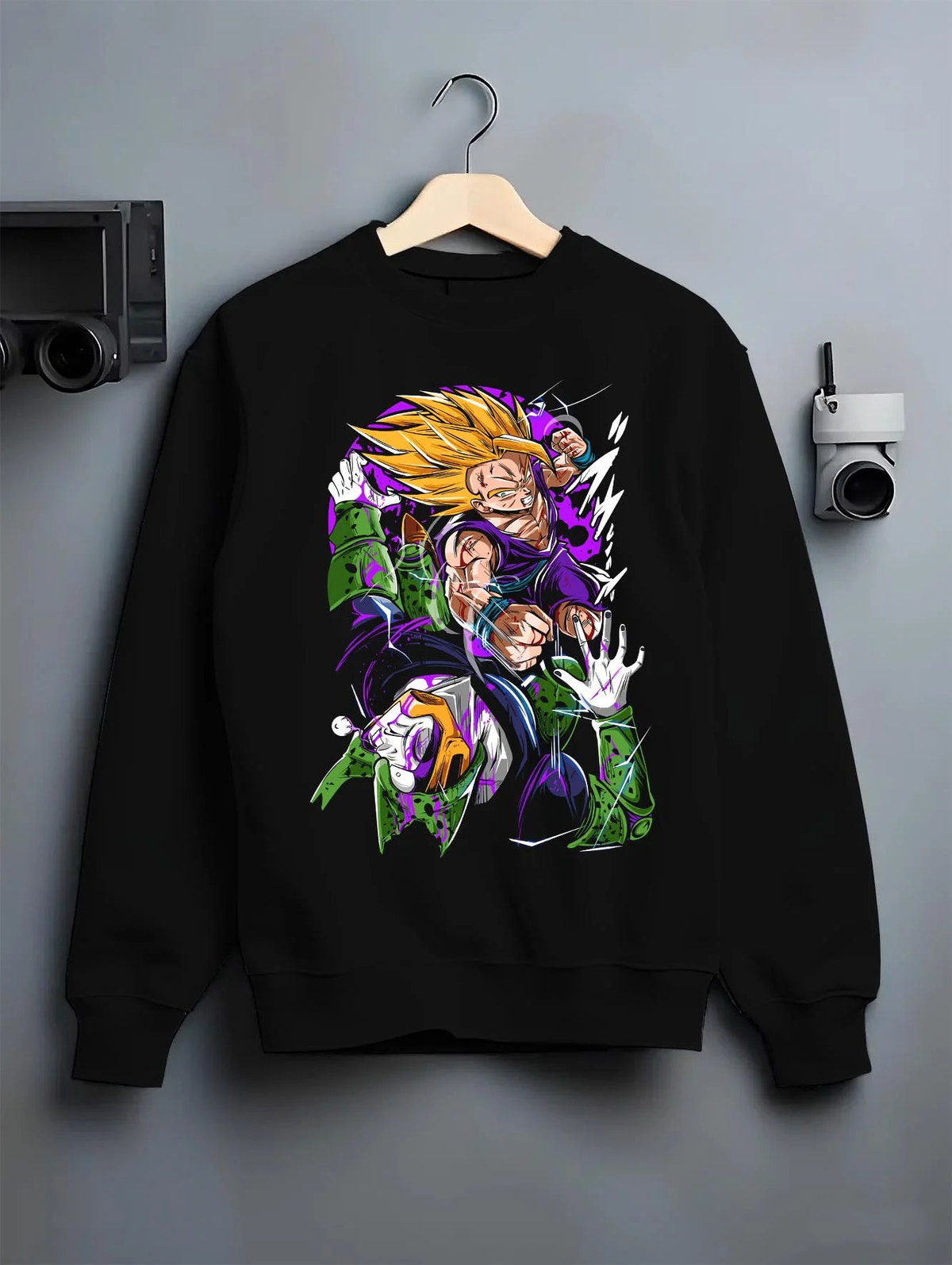 Black crewneck sweatshirt on hanger featuring Vegeta Super Saiyan Cell Saga battle Dragon Ball Z artwork.