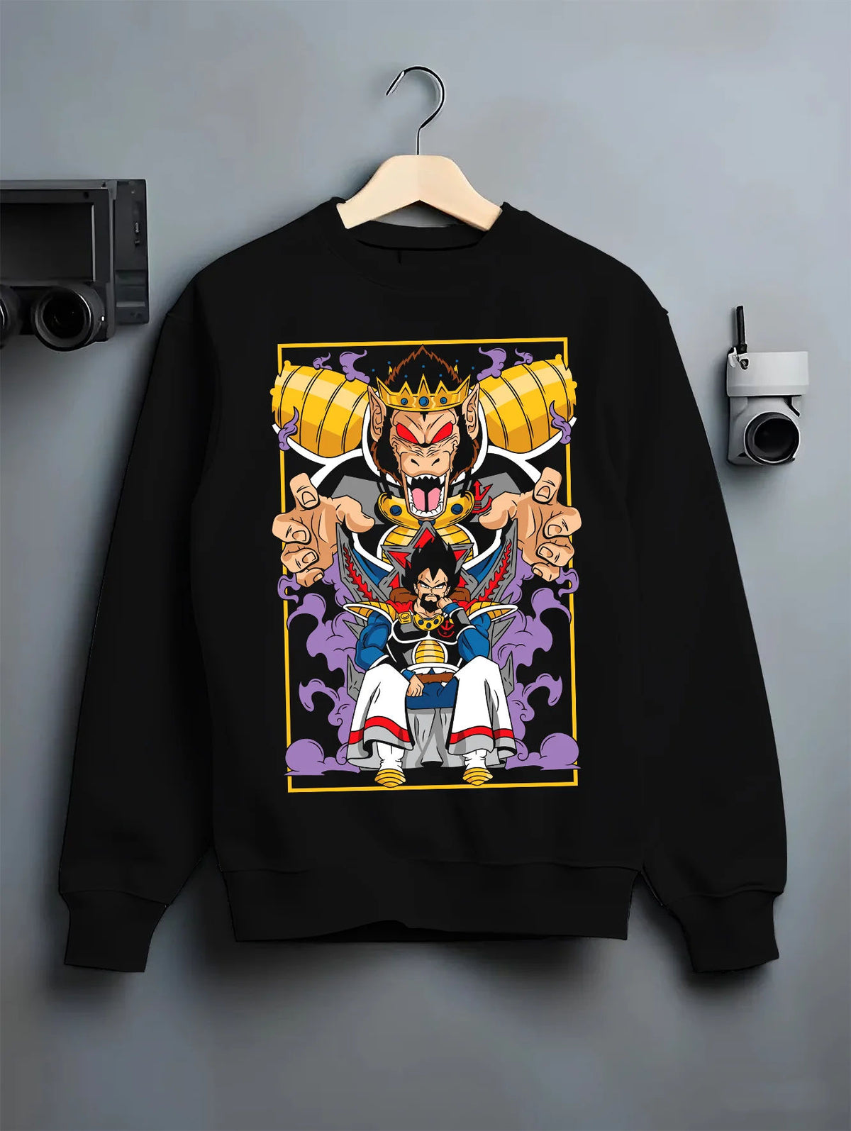 Black crewneck sweatshirt on hanger with Vegeta and Saiyan royalty / Great Ape motif from Dragon Ball illustrated back