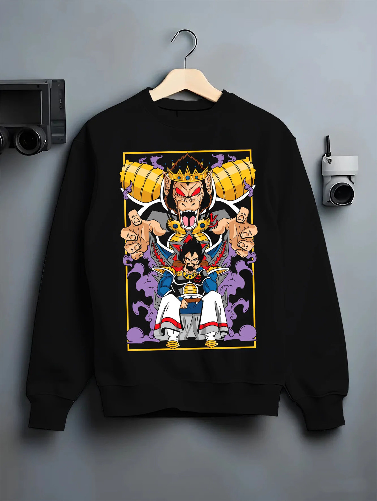 Black crewneck sweatshirt on hanger with Vegeta and Saiyan royalty / Great Ape motif from Dragon Ball illustrated back