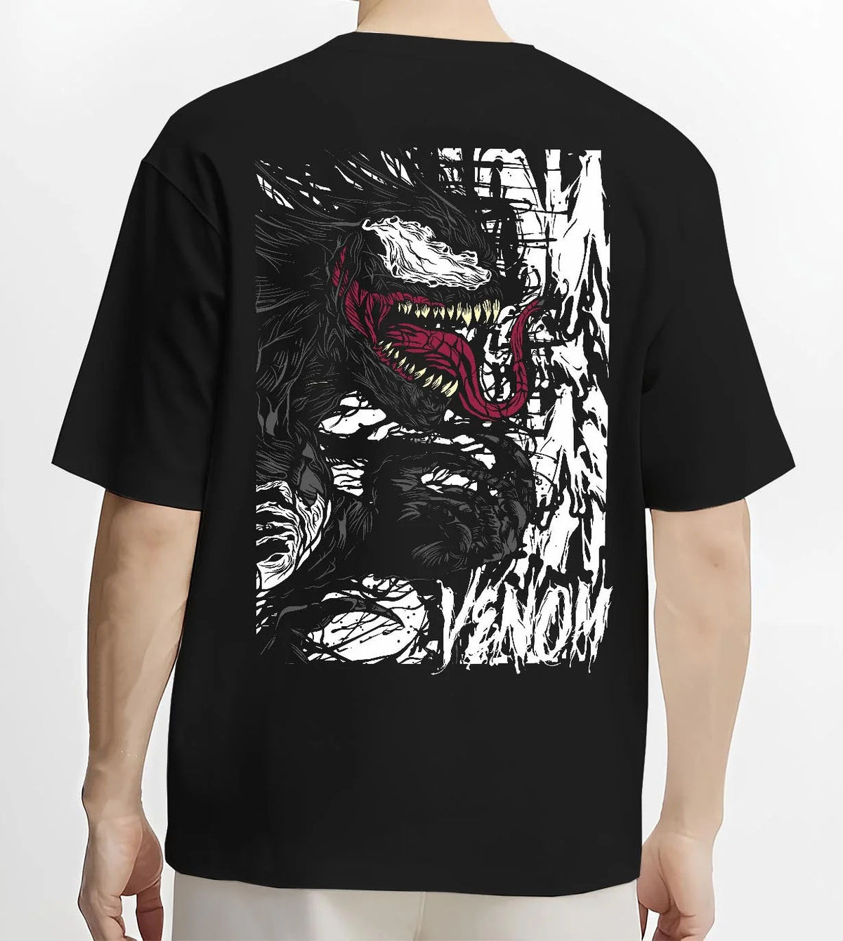 Black T-shirt worn by male model from the back featuring Venom white symbiote monster portrait Marvel artwork.