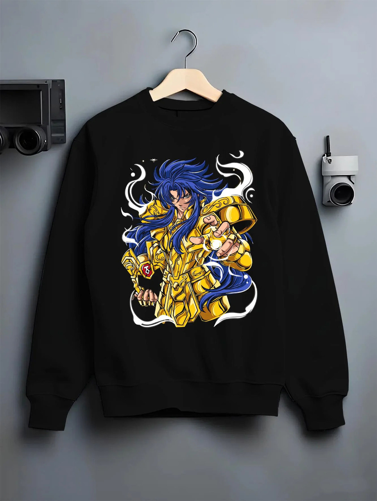 Black crewneck sweatshirt on hanger featuring Gemini Saga Gold Saint cosmos power Saint Seiya artwork.