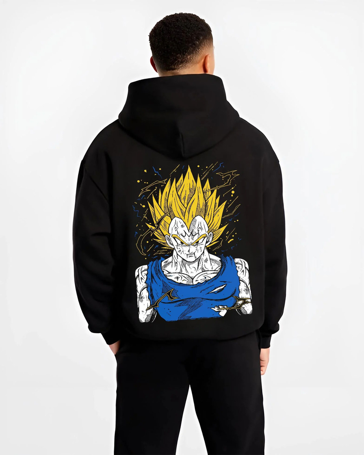 Black hoodie worn by male model from the back featuring Majin Vegeta battle-worn Saiyan Dragon Ball Z artwork.
