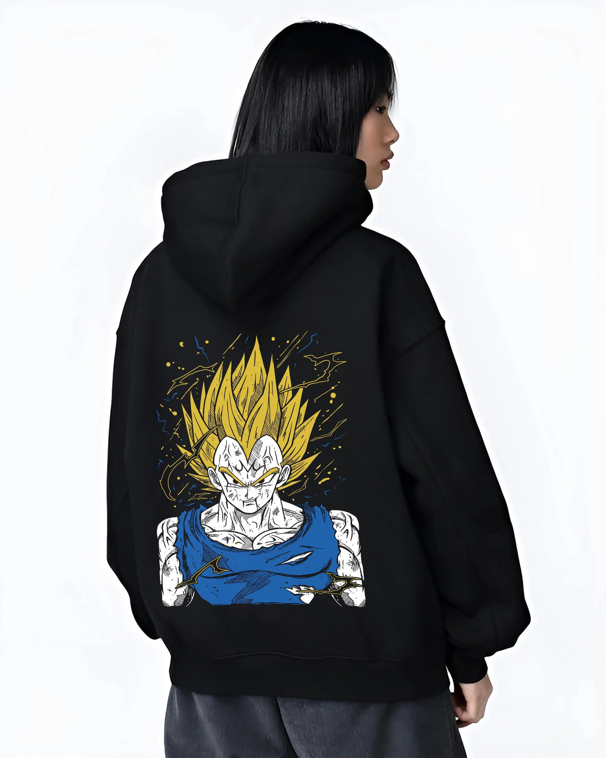 Black hoodie worn by female model from the back featuring Majin Vegeta battle-worn Saiyan Dragon Ball Z artwork.